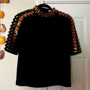 Top with studded jewels.